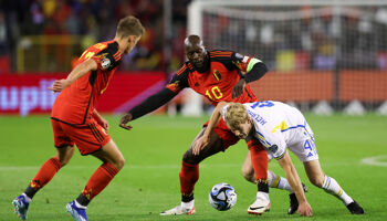 Romelu Lukaku of Belgium battles for possession with Filip Helander of Sweden during the UEFA EURO 2024 European qualifier match between Belgium and Sweden which was abandoned