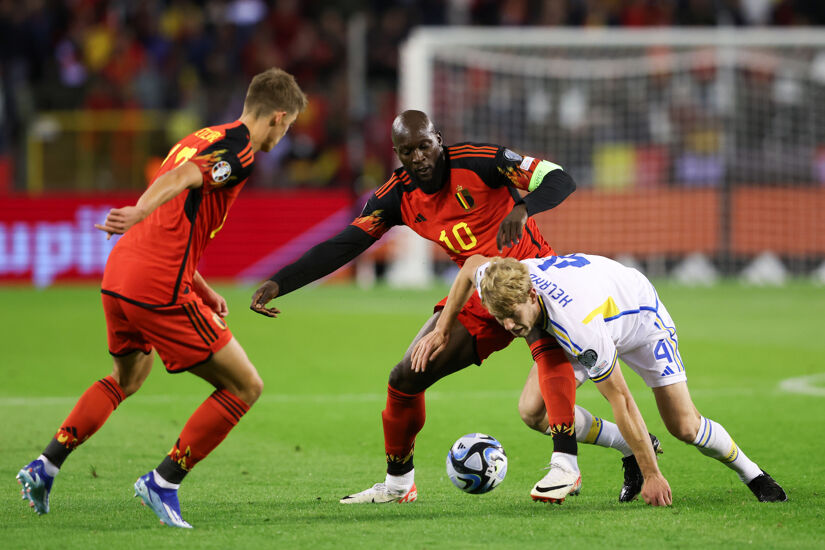 Romelu Lukaku of Belgium battles for possession with Filip Helander of Sweden during the UEFA EURO 2024 European qualifier match between Belgium and Sweden which was abandoned