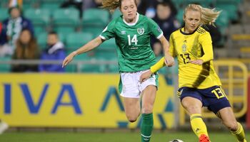 Sweden's Amanda Ilestedt competes for the ball with Heather Payne of Ireland during the World Cup qualifier in Tallaght in October 2021.
