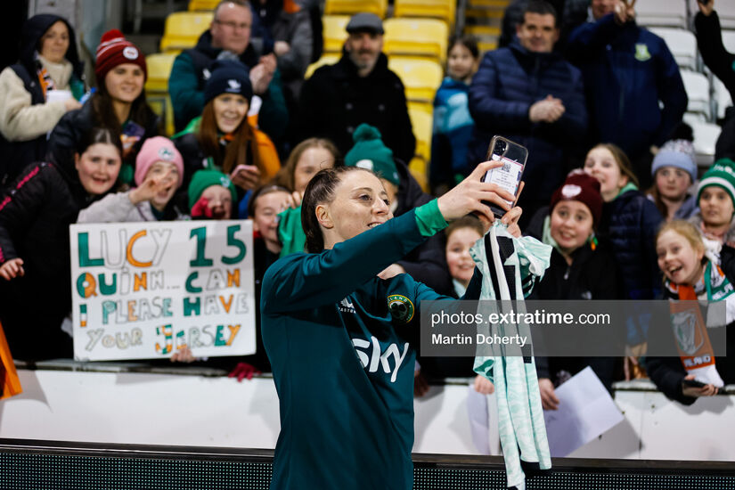 Lucy Quinn poses with Ireland fans after the Republic of Ireland -v- Wales at Tallagh Stadium on 27 February 2024.
