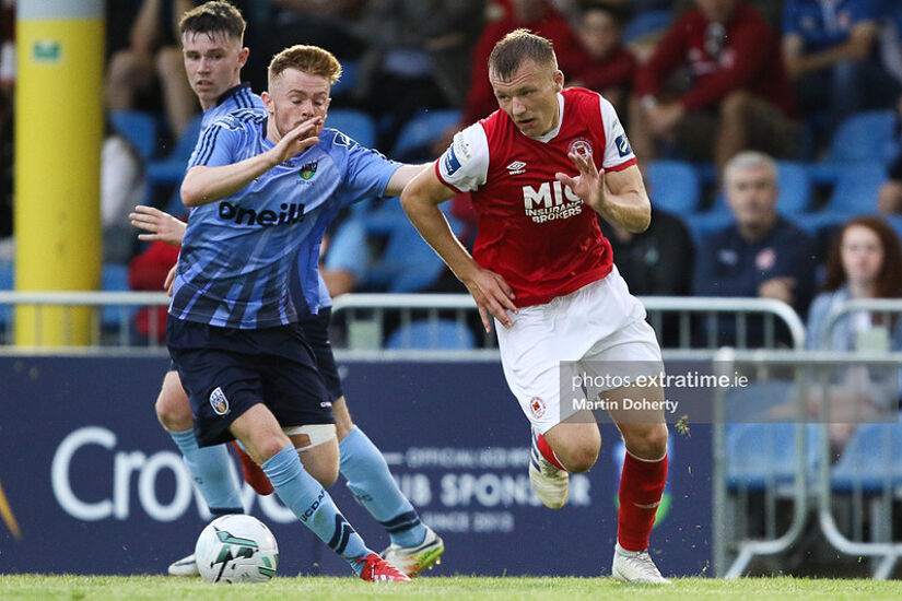 St Patrick's Athletic's Jamie Lennon in action against Paul Doyle of UCD.