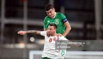 John Egan competes for a header during Ireland's 3-1 friendly win over Bulgaria in 2019.