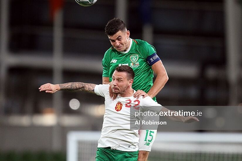 John Egan competes for a header during Ireland's 3-1 friendly win over Bulgaria in 2019.