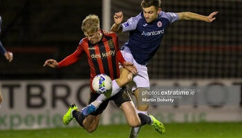 Kris Twardek (Bohemian FC) tackled by Alex Cooper (Sligo Rovers)