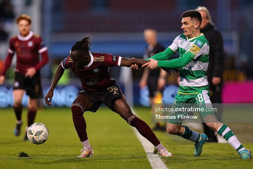 Jeannot Esua of Galway United FC in action against Trevor Clarke of Shamrock Rovers FC during the SSE Airtricity Men's Premier Division match between Shamrock Rovers FC and Galway United FC at Tallaght Stadium, Dublin on April 26, 2024