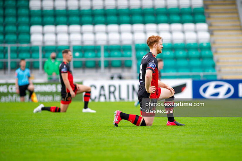 Hugh Douglas takes the knee in Tallaght Stadium in Drogheda's game against Rovers II in the First Division last season