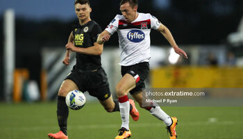 Luke McNally of St Patrick's Athletic vies for the ball with Dundalk's David McMillan during their SSE Airtricity League Premier Division fixture at Oriel Park on July 31st, 2020.