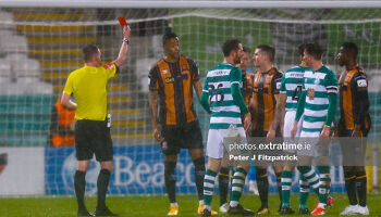Referee Damien MacGraith shows the red card to Sonni Nattestad in the President's Cup clash between the sides in February