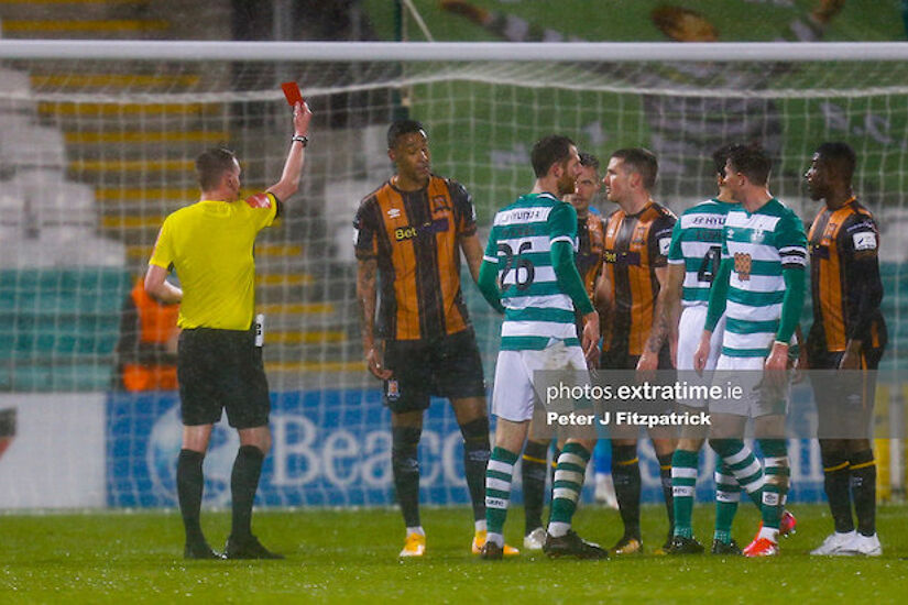 Referee Damien MacGraith shows the red card to Sonni Nattestad in the President's Cup clash between the sides in February