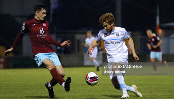 Pierce Phillips of Cobh Ramblers tackles Paul Doyle of UCD during the Students' 4-0 win at St Colman's Park on April 3rd, 2021.