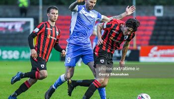 Longford Town FC's Joe Manley, shields the ball from Adam Foley of Finn Harps, during the Longford Town v Finn Harps, SSE Airtricity Premier Division match at Bishops Gate, Longford.