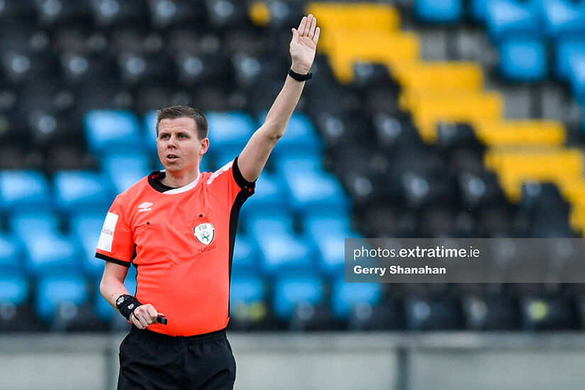 Referee Alan Carey