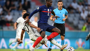 Paul Pogba of France is challenged by Serge Gnabry of Germany during their UEFA Euro 2020 Championship Group F game
