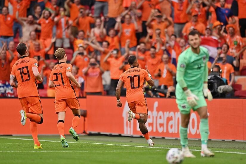 Memphis Depay celebrates after scoring the Dutch side's first goal against Austria at Johan Cruijff Arena 