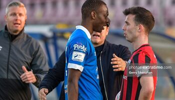 Prince Mutswunguma of Waterford FC and Longford Town FC, Michael McDonnell, eyeball each other, during the Longford Town v Waterford FC, SSE Airtricity Premier Division match.