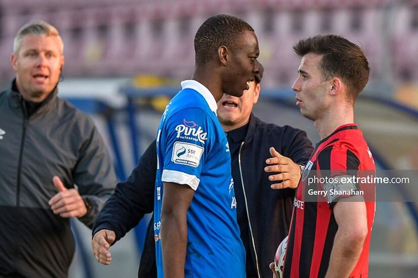 Prince Mutswunguma of Waterford FC and Longford Town FC, Michael McDonnell, eyeball each other, during the Longford Town v Waterford FC, SSE Airtricity Premier Division match.