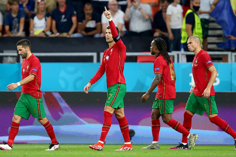 Cristiano Ronaldo of Portugal celebrates after scoring their side's second goal from the penalty spot during the UEFA Euro 2020 Championship Group F match against France