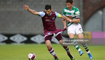 Dinny Corcoran battling with Ronan Finn in Tallaght Stadium