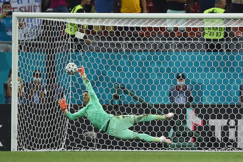 Yann Sommer of Switzerland saves the France fifth and decisive penalty taken by Kylian Mbappe 