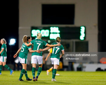 Ireland's Leanne Kiernan, Diane Caldwell and Emily Whelan celebrate Ireland's 3-2 win.