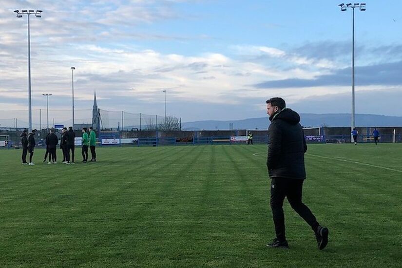 Stephen Bradley walks across Fairview Rangers' pitch ahead of friendly against the Limerick side