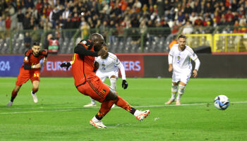 Romelu Lukaku of Belgium scores the team's first goal during the UEFA EURO 2024 European qualifier match between Belgium and Sweden at King Baudouin Stadium