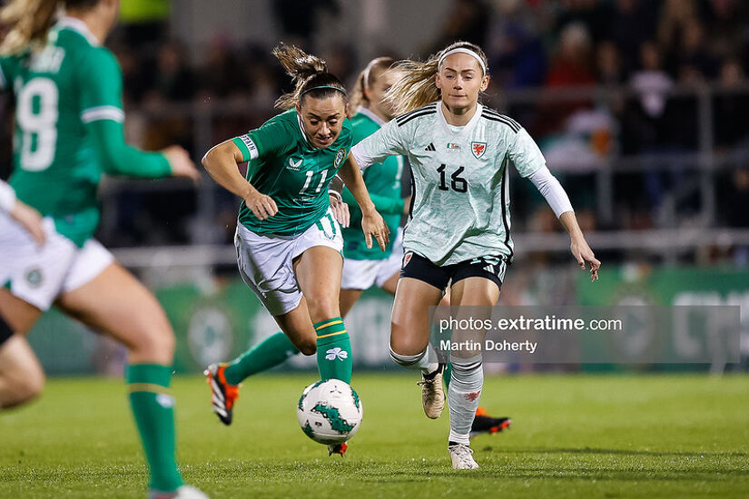 Katie McCabe of Ireland in action against Charlie Estcourt of Cymru in the friendly between the sides in Tallaght February 2024