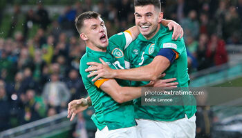 John Egan celebrates with Jason Knight after opening the scoring for Ireland in a 3-2 UEFA Nations League win over Armenia at the Aviva Stadium.