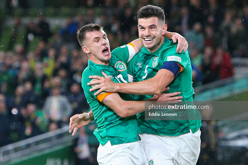 John Egan celebrates with Jason Knight after opening the scoring for Ireland in a 3-2 UEFA Nations League win over Armenia at the Aviva Stadium.