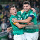 John Egan celebrates with Jason Knight after opening the scoring for Ireland in a 3-2 UEFA Nations League win over Armenia at the Aviva Stadium.
