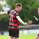 John Martin celebrates his goal with Hayden Muller