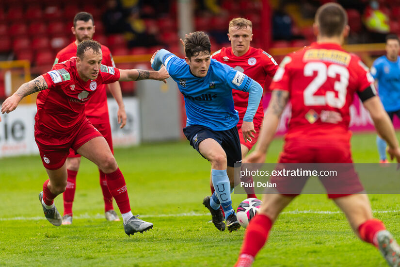 Colm Whelan of UCD shrugs off the challenge of Shelbourne's Ally Gilchrist during Shels' 3-1 win at Tolka Park on May 21st, 2021.