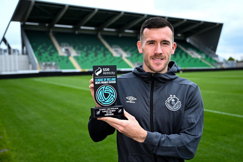 Aaron Greene of Shamrock Rovers poses with his SSE Airtricity / SWI Player of the Month Award for April 2024 at Tallaght Stadium in Dublin