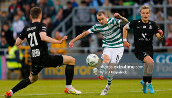 Breidablik skipper Höskuldur Gunnlaugsson (right) watching a pass from Shamrock Rovers' Sean Kavanagh in the first leg in Tallaght