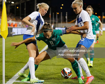Captain Katie McCabe holding off the Finnish defenders  late on in Thursday's game in Tallaght