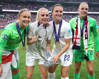 England players celebrate with the trophy after their UEFA Women's Euro 2022 final win over Germany at Wembley Stadium on July 31, 2022