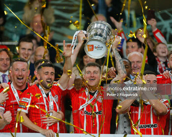 The McEleney brothers Shane (second left) and Patrick (holding cup) celebrate winning the FAI Cup with Derry City