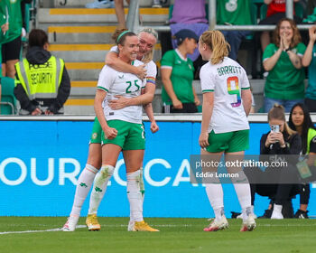 Claire O'Riordan celebrating her goal against Zambia with Ireland captain Louise Quinn and Amber Barrett