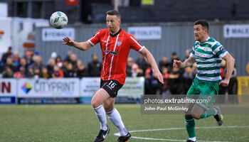 Shane McEleney on the ball ahead of Aaron Greene's during Derry's 2-0 home defeat to the Hoops in May 2023