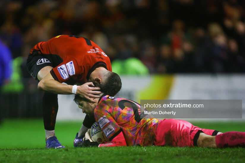 Rory Feely congratulates Tadhg Ryan after the goalkeeper saved a penalty during Bohemians meeting with Finn Harps on Friday, 21 October 2022.