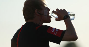 A match official takes a drink of water during the water break in the SSE Airtricity League Premier Division game between Dundalk and Cork City  on Friday 29th June 2018
