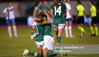 Denise O'Sullivan (left) and Katie McCabe embrace at the final whistle in Tallaght with a World Cup play-off secured