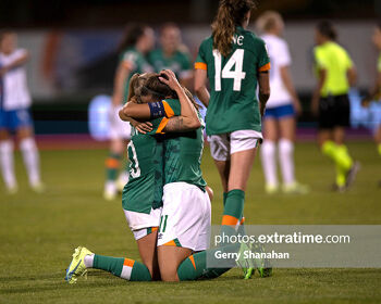 Denise O'Sullivan (left) and Katie McCabe embrace at the final whistle in Tallaght with a World Cup play-off secured