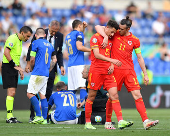 Ethan Ampadu of Wales looks dejected with team mate Gareth Bale after he is shown a red card by Match Referee, Ovidiu Hategan during the UEFA Euro 2020 Championship Group A match between Italy and Wales at Olimpico Stadium on June 20, 2021 in Rome, Italy.