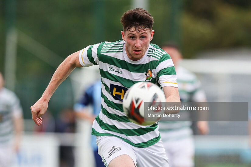 Christy McLoughlin of Cockhill Celtic keeps his eyes on the ball against ST Mochta's in an FAI Intermediate Cup game in 2021