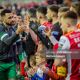Hoops skipper Pico Lopes leads his team in the pre-match handshakes with the Saints ahead of their league game in Inchicore in April 2024