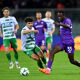 Michael Kayode of Fiorentina runs with the ball under pressure from Ben Clark of The New Saints during the UEFA Conference League 2024/25 League Phase MD1 match between ACF Fiorentina and The New Saints FC at  on October 03, 2024 in Florence, Italy.