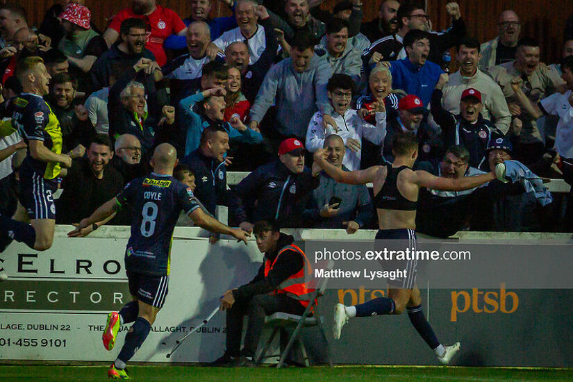 Evan Caffrey celebrates scoring his winner for Shelbourne against St Pat's in May with Mark Coyle (left)