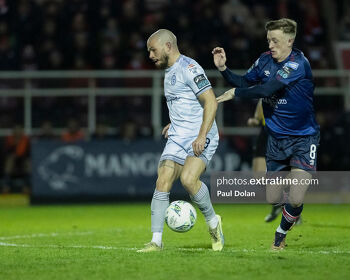 Shelbourne's Mark Coyle and Saint Chris Forrester in action in last February's 1-0 win for Pat's at Richmond Park