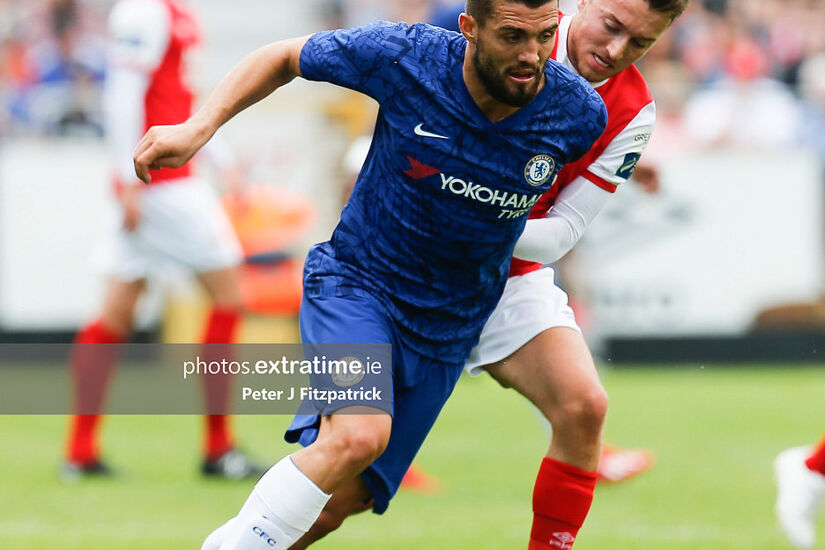 Mateo Kovacic of Chelsea FC steals the ball away from Darragh Markey of St Patricks Athletic